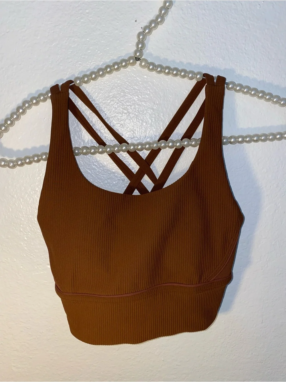 Lululemon brown ribbed sports bra with criss-cross back detail, size 4